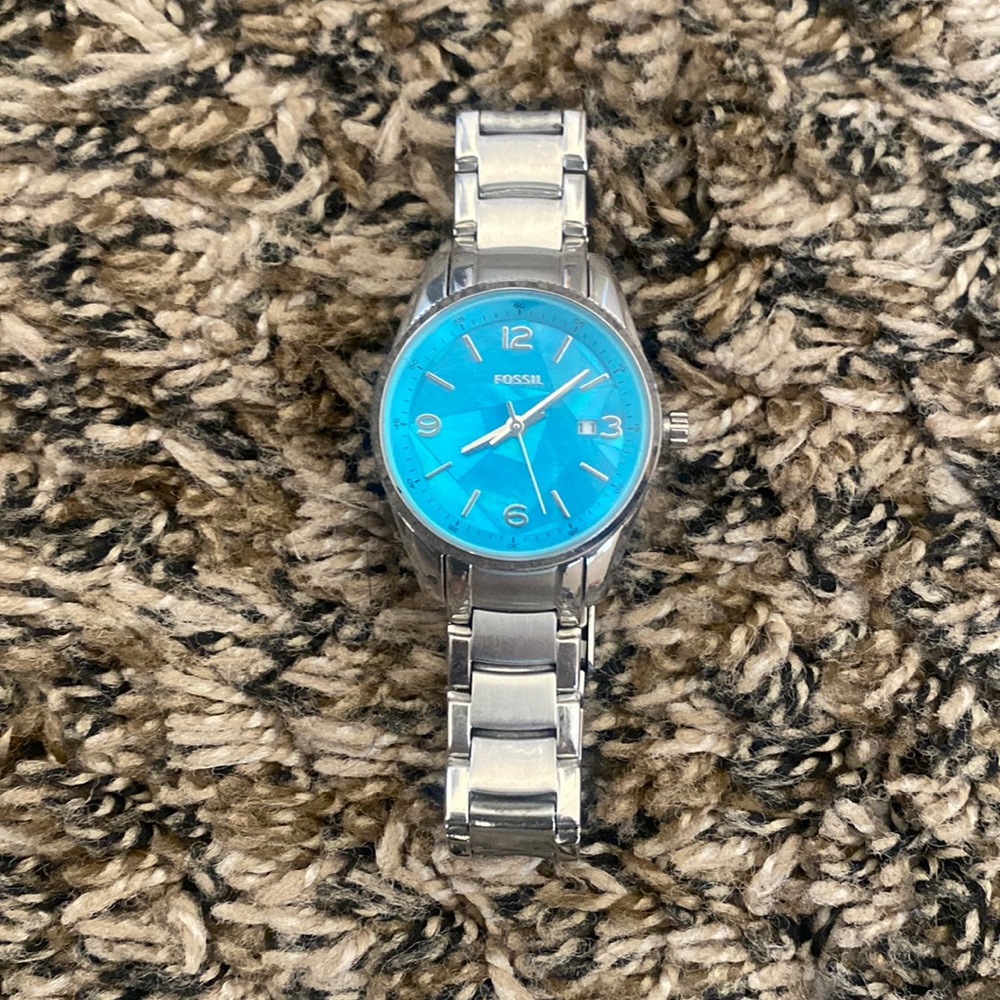 Silver and blue fossil watch. Lightly used